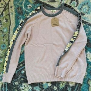 Small new with tags blush sweater with sequin details!